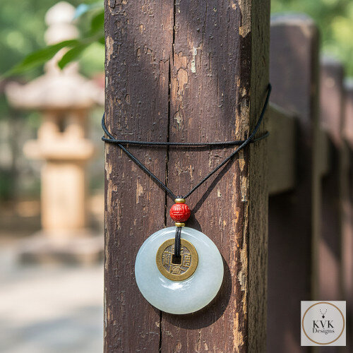 Jade "Bi" Disc with I Ching Coin