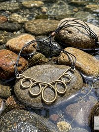 https://www.etsy.com/listing/1859016607/boho-leather-silver-choker-bead-necklace?